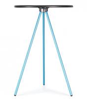 Tripod style camp table with a circular hard surface top