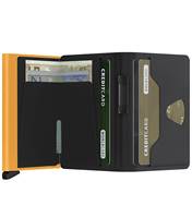 Holds 4 extra cards, banknotes and business cards