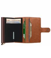 Includes two interior pockets for holding cards, notes, receipts, business cards and some coins