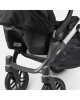 Stroller folds with the adapters on