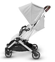 Pivots down to remain attached while folding with stroller