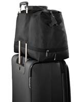 Rear sleeve for sliding bag over wheeled luggage handles
