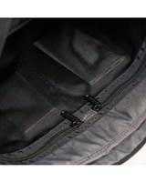 Main compartment has two zippered mesh pockets